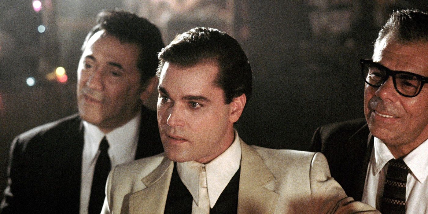 Henry Hill sitting in a club with other gangsters in Goodfellas