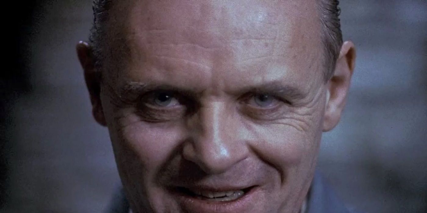 Sir Anthony Hopkins as Hannibal Lecter smiling deviously in The Silence of the Lambs