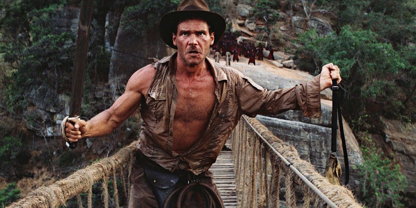 Harrison Ford holding a bag of sacred stones in Indiana Jones and the Temple of Doom