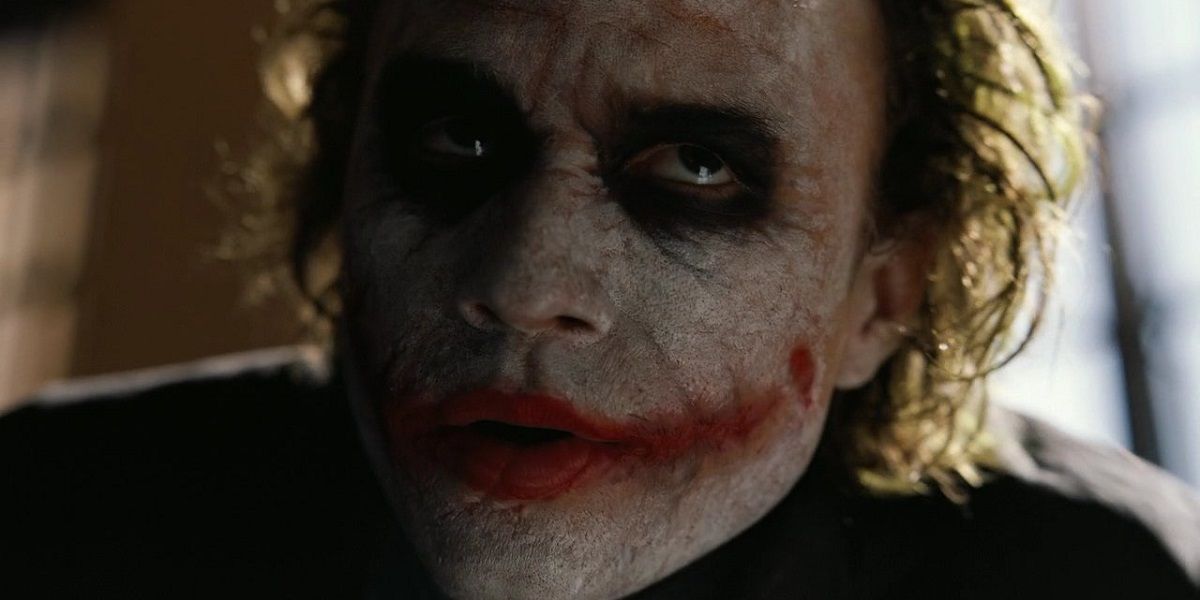 The Joker reveals himself to the mob bank manager in the opening scene of The Dark Knight