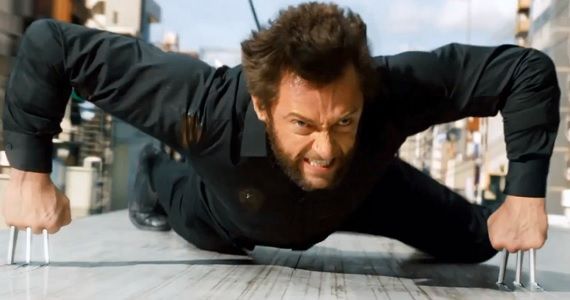 Hugh Jackman fights on a train as Logan in The Wolverine