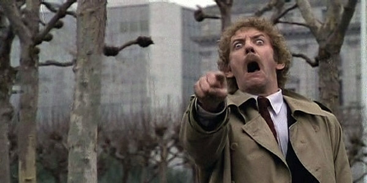 Donald Sutherland looking horrified in Invasion of the Body Snatchers