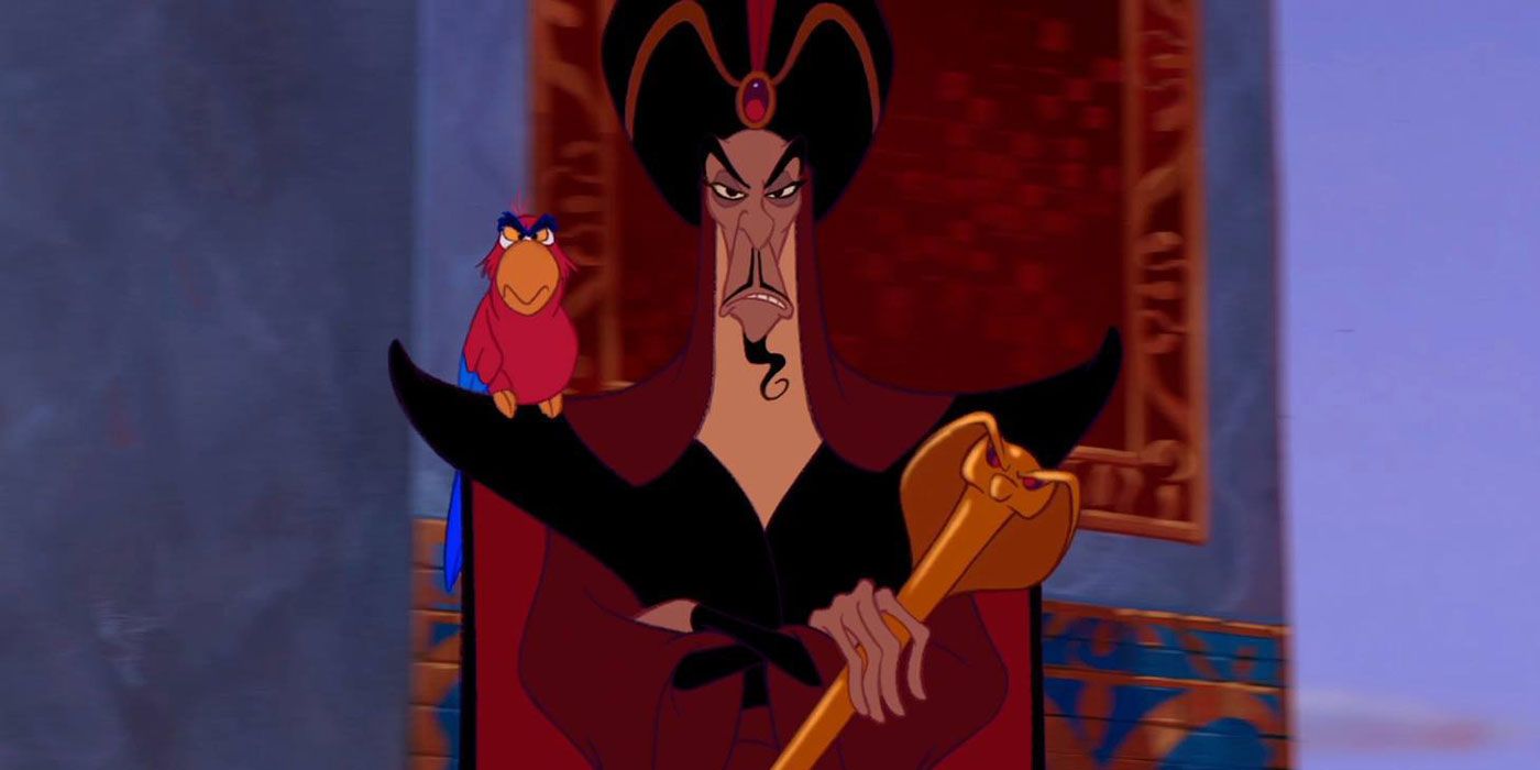 Jafar looks on sternly with Iago on his shoulder from Aladdin 