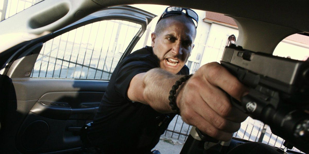 Brian pointing a gun in End of Watch
