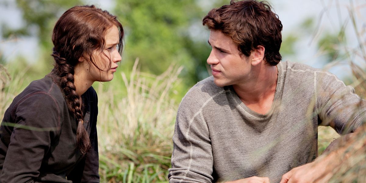 Jennifer Lawrence as Katniss and Liam Hemsworth as Gale Hawthorne in The Hunger Games.