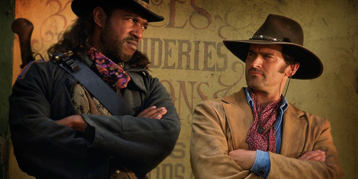 Two Cowboys stand side by side in The Adventures of Brisco County, Jr.