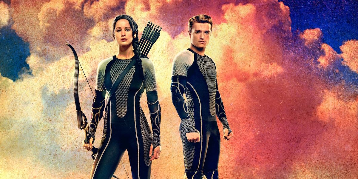 Katniss and Peeta in their wetsuits in a promo image for The Hunger Games: Catching Fire.