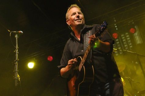 Kevin Costner performing with Modern West
