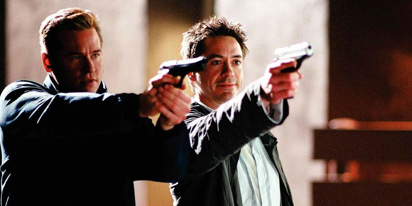 Val Kilmer and Robert Downey Jr. pointing guns in Kiss Kiss Bang Bang