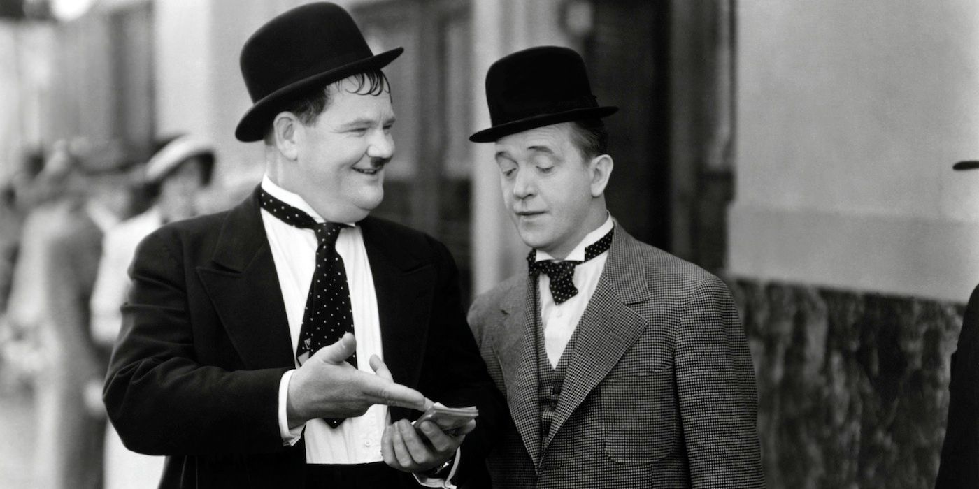 Stan Laurel & Oliver Hardy in their iconic bowler hats.