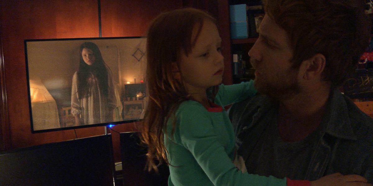Ivy George as Leila and Chris J. Murray as Ryan in Paranormal Activity: The Ghost Dimension