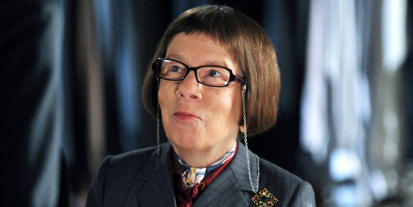 Linda Hunt as Hetty Lange smiling at someone or something offscreen in NCIS Los Angeles