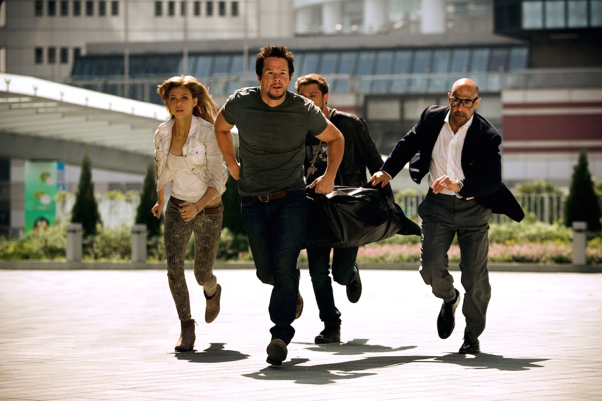 Mark Wahlberg, Nicola Peltz and Stanley Tucci in Transformers 4