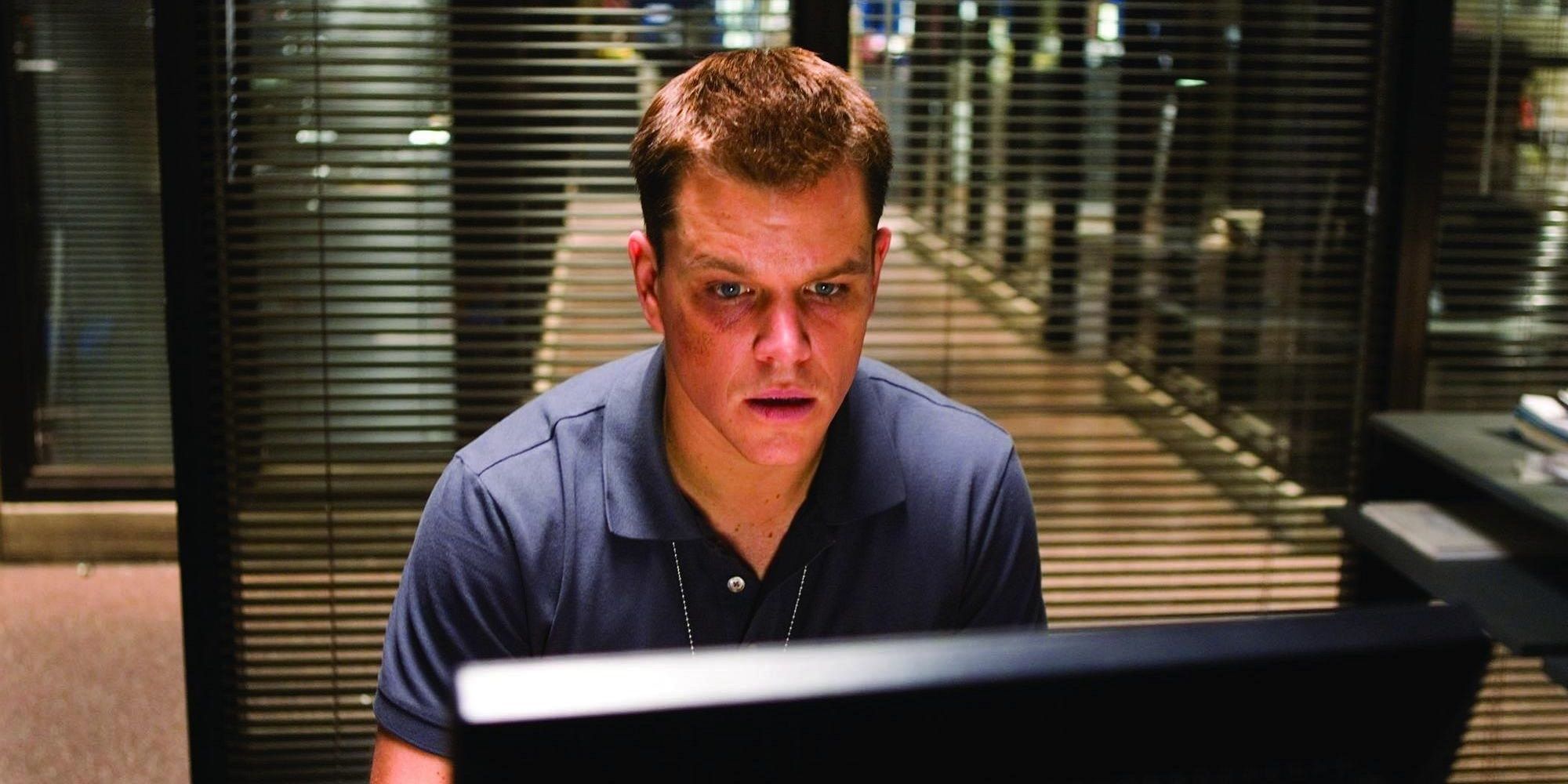 Matt Damon looks concerned at a computer from The Departed 