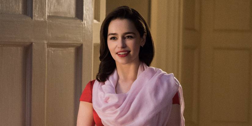 Emilia Clarke smiling in a nice dress in Me Before You