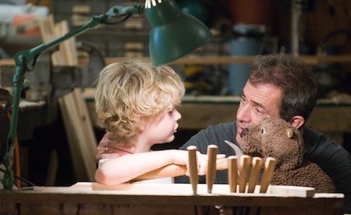 Riley Thomas Stewart and Mel Gibson in The Beaver