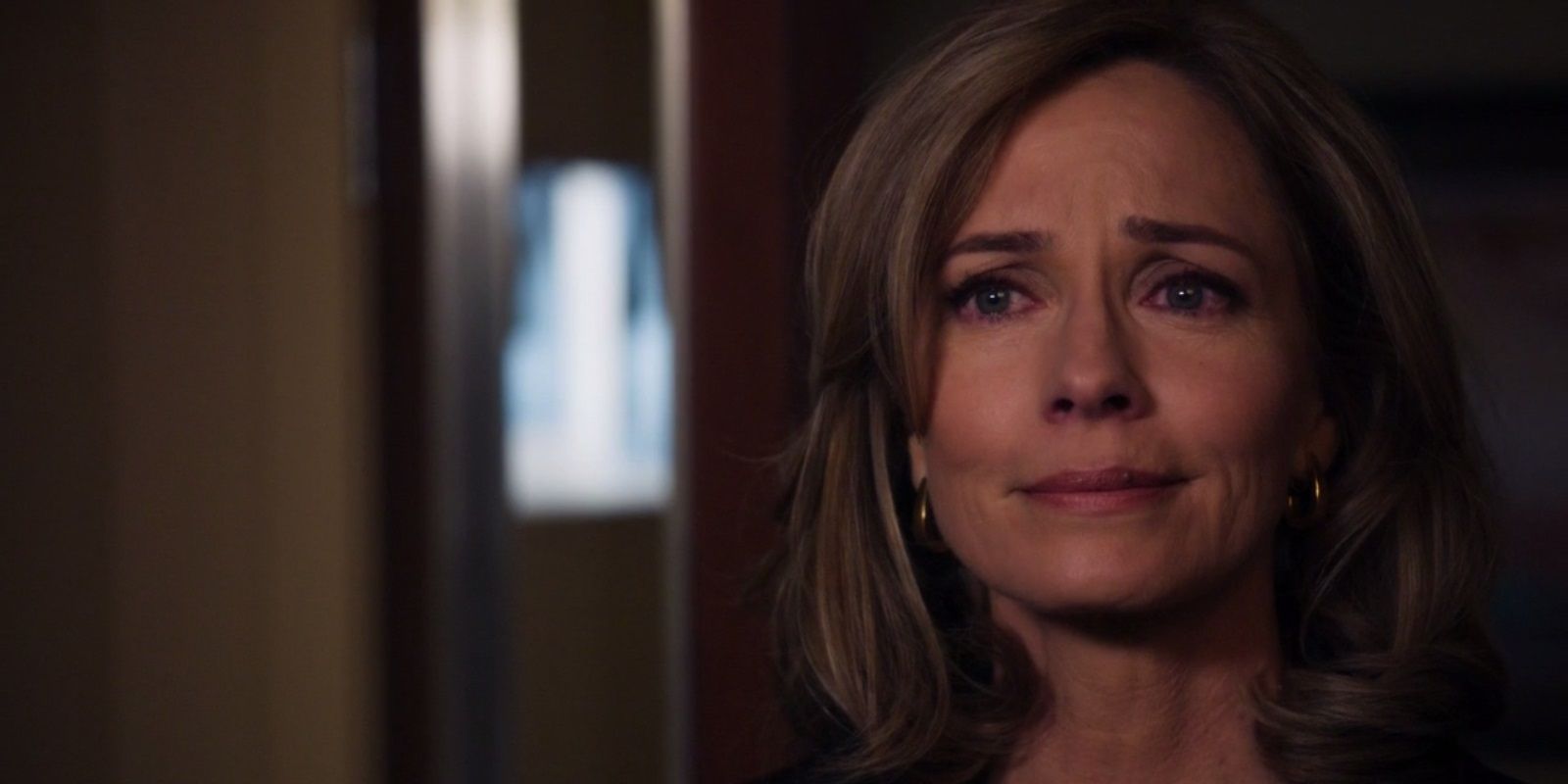 Moira Queen crying in Arrow