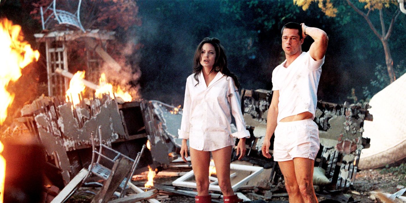 Brad Pitt and Angelina Jolie in their underwear standing among debris in Mr. and Mrs. Smith 