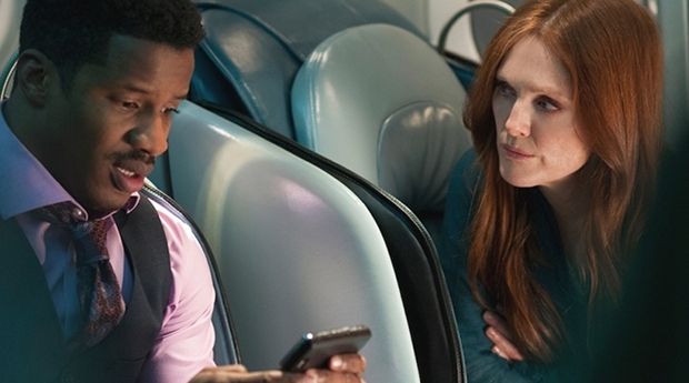 Nate Parker and Juilanne Moore in 'Non-Stop' (2014)