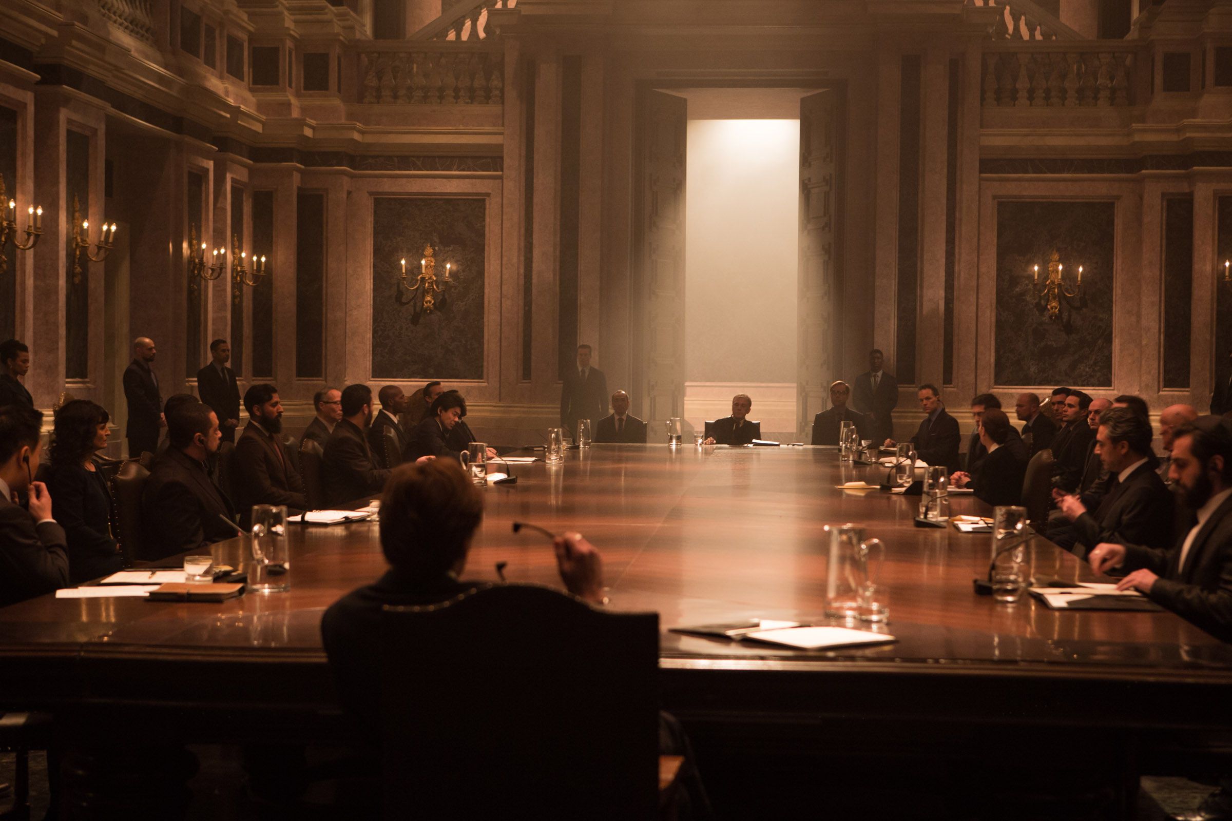 Oberhauser (Christoph Waltz) chairs a meeting in SPECTRE