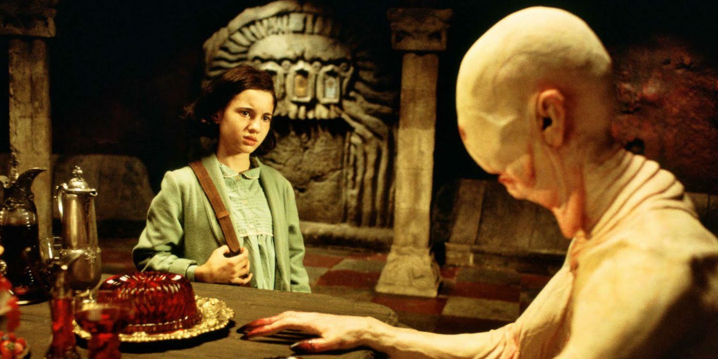 Ofelia looking at the Pale Man in Pan's Labyrinth