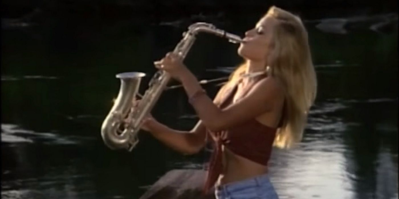 Pamela Anderson playing a saxophone in Baywatch.