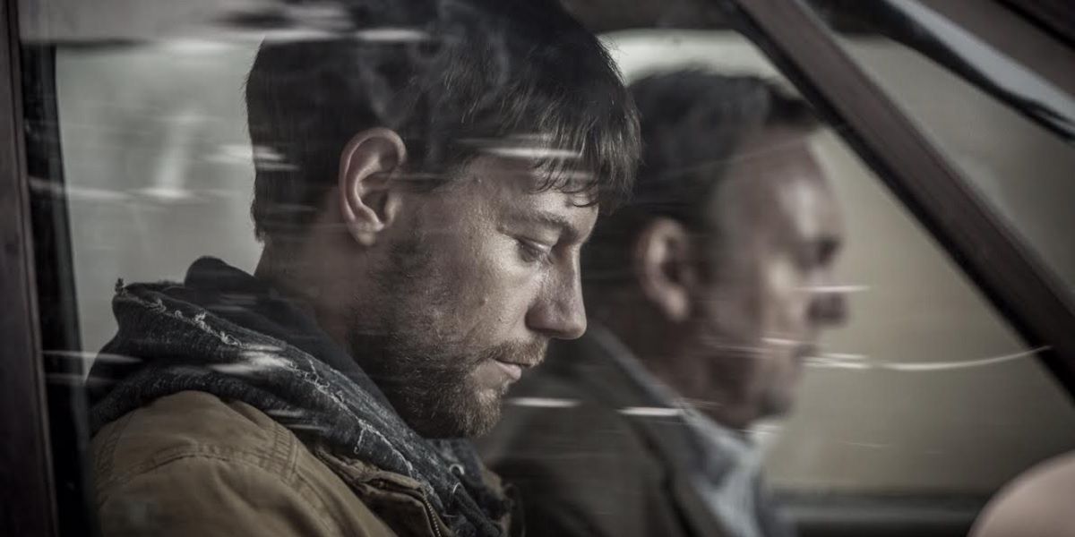 Patrick Fugit and Philip Glenister in Outcast