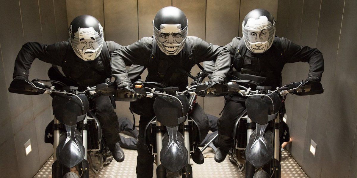 Three masked motorcycles riders with masks of former presidents