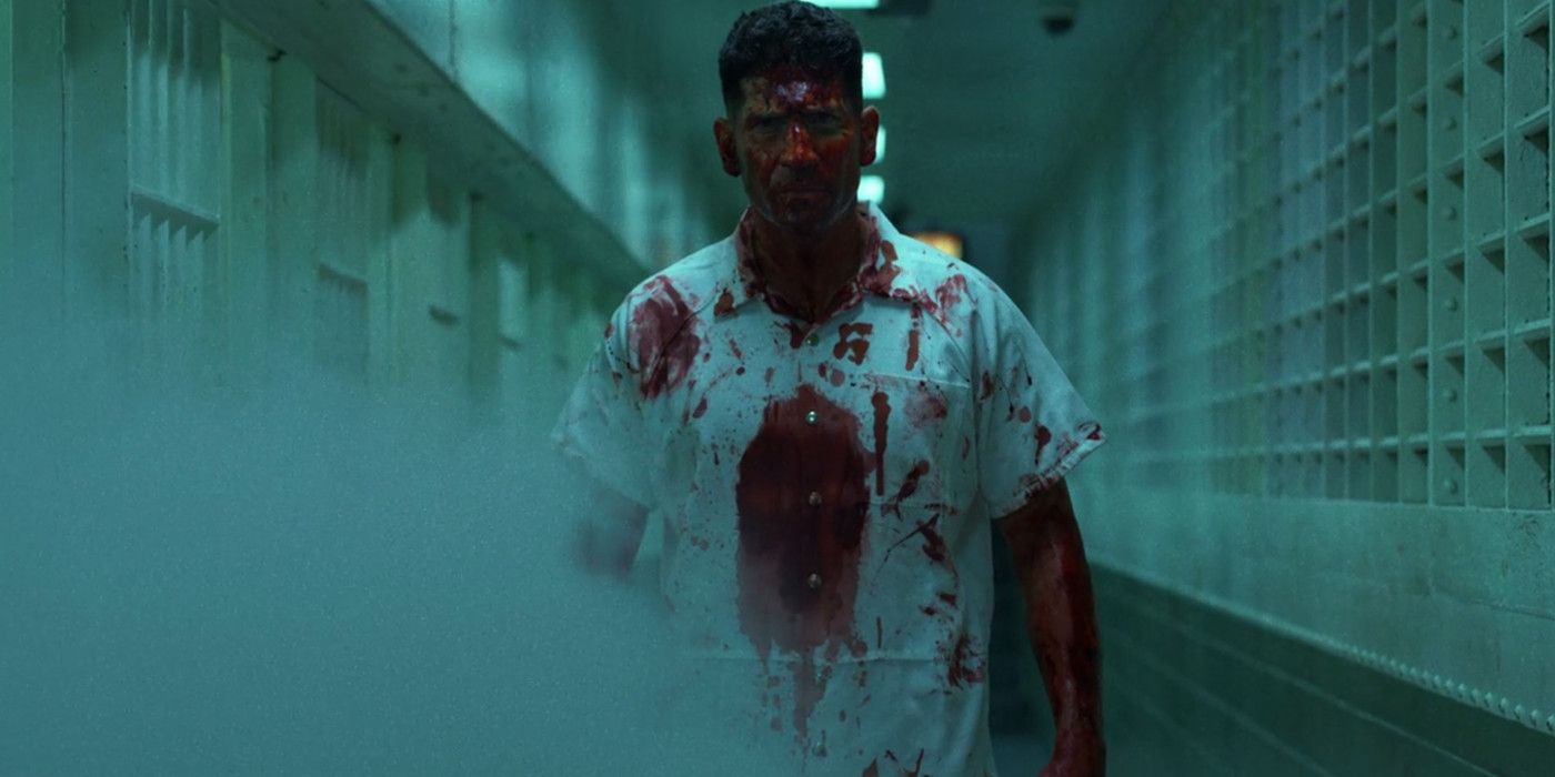 Frank Castle AKA the Punisher (Jon Bernthal) is bloodied after taking down all the inmates in a prison fight.