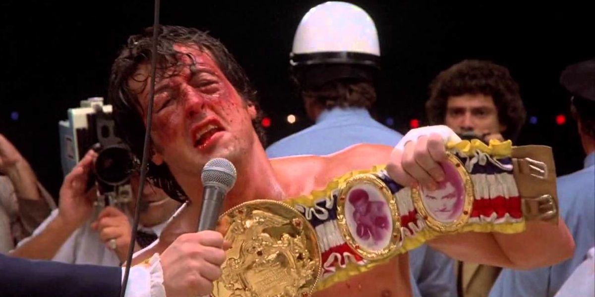 Rocky holds up championship belt in Rocky II