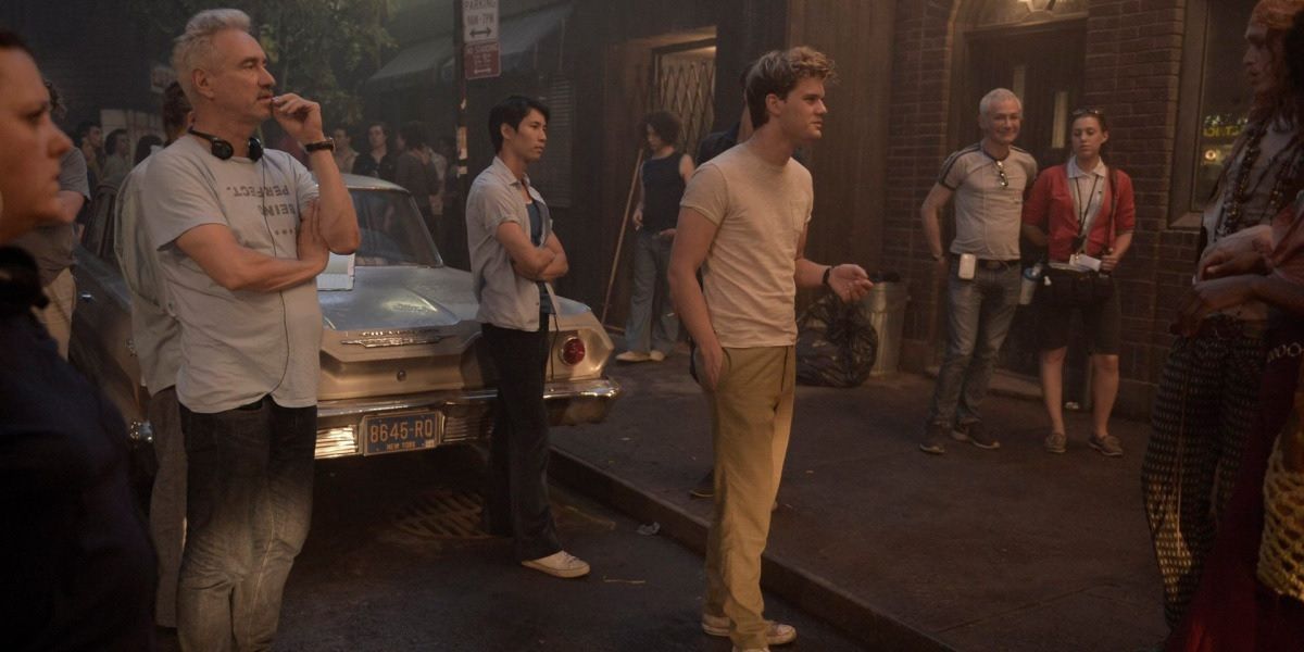 Roland Emmerich and Jeremy Irvine on the set of Stonewall