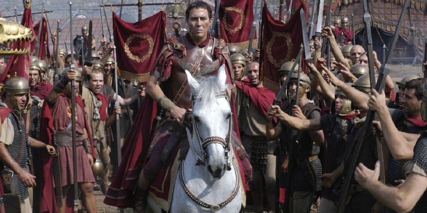 Ciaran Hinds as Julius Caesar riding on a horse in Rome 