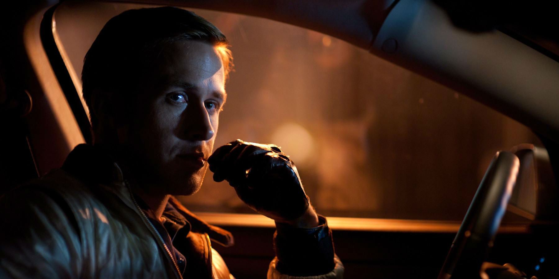 Ryan Gosling sitting in his car in Drive