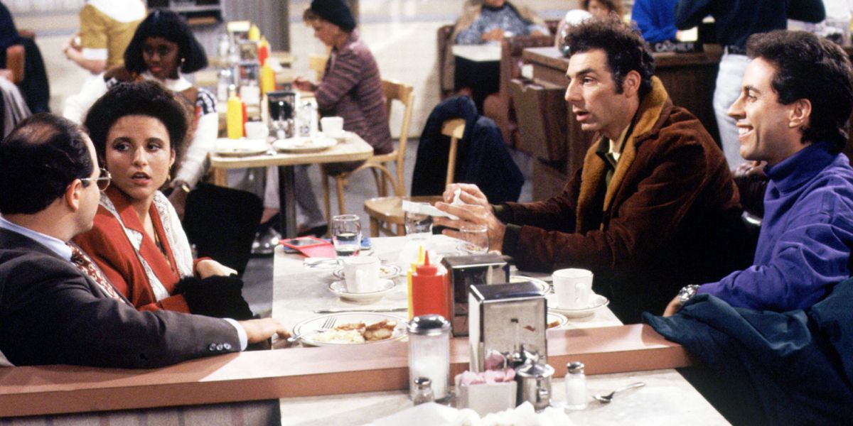 Jerry, George, Elaine, and Kramer at Monk's Cafe in Seinfeld.