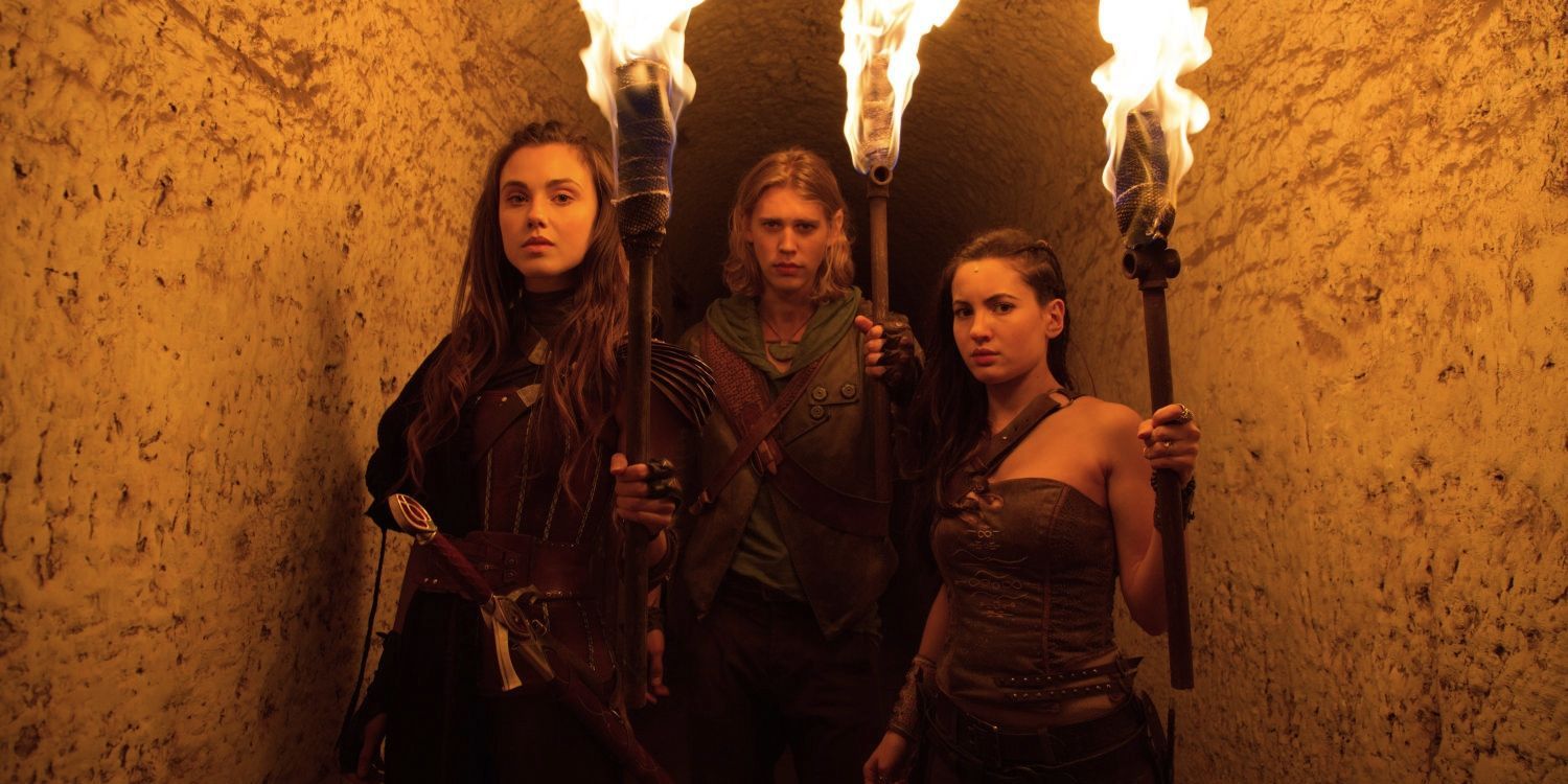 Amberlee, Wil, and Eretria with torches in The Shannara Chronicles