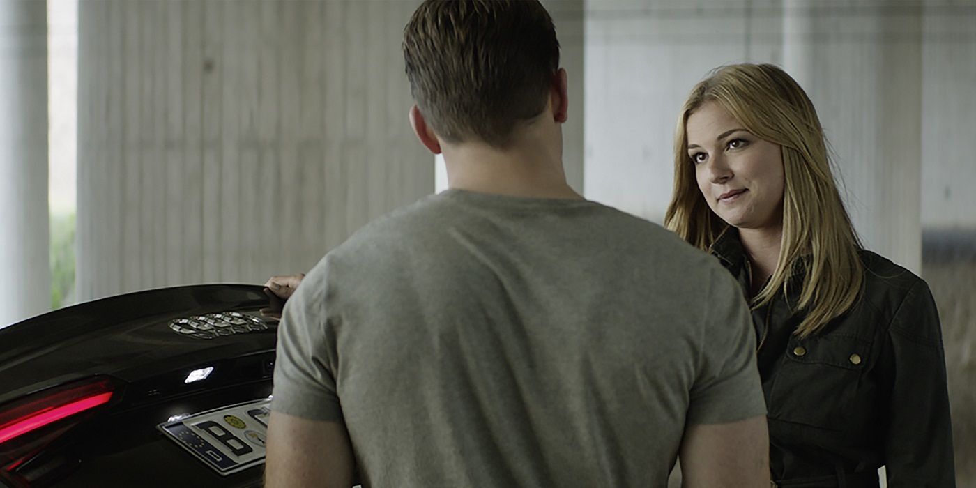 An image of Sharon Carter and Steve standing in a garage. Sharon is smiling at Steve