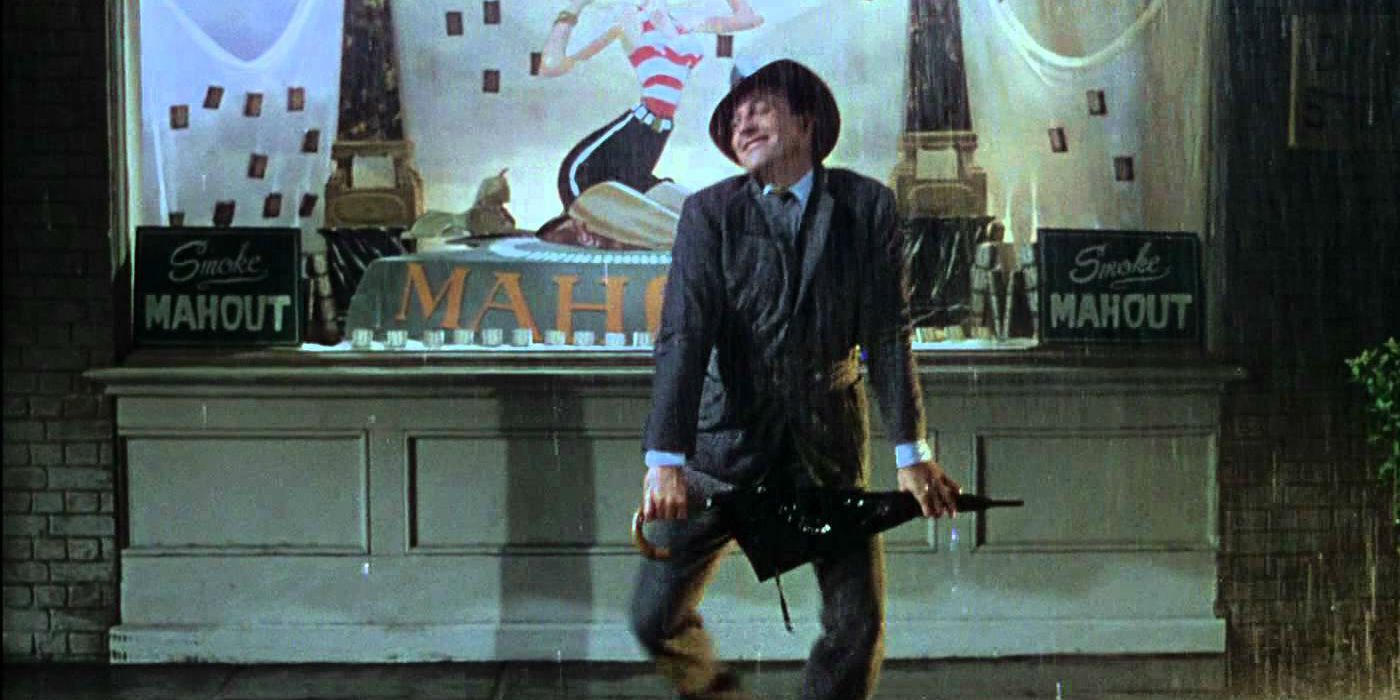 A man dances with his umbrella in Singin' In The Rain