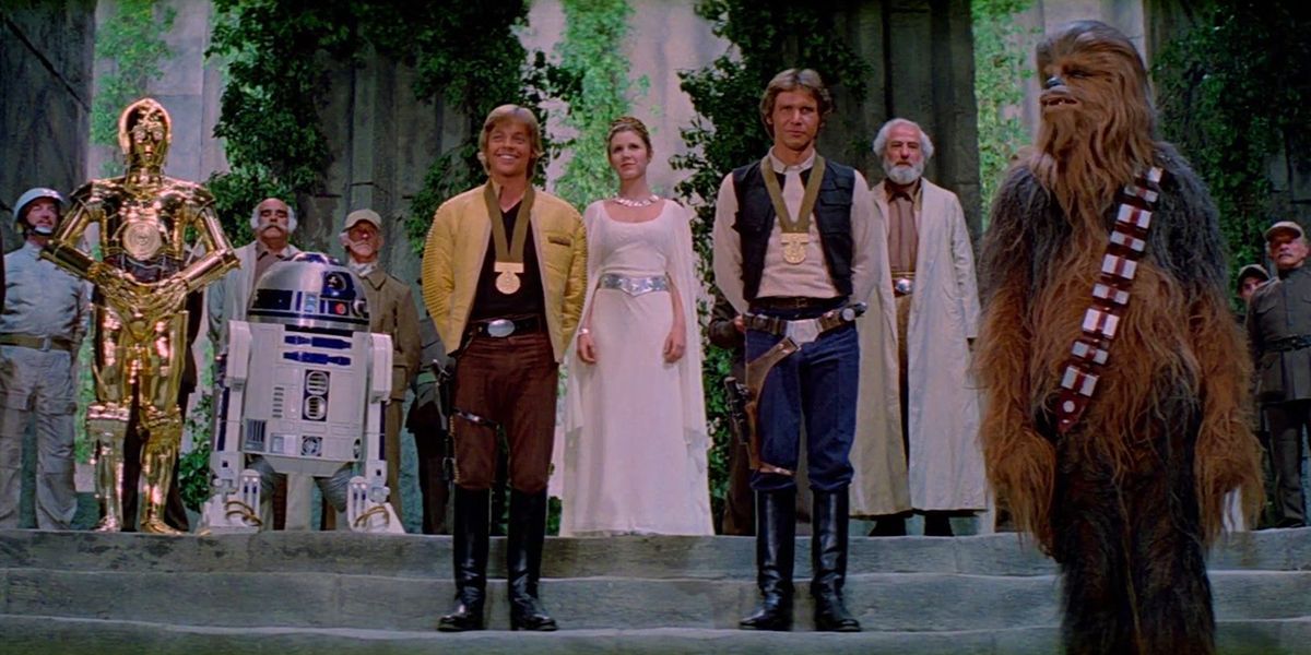 Luke, Leia, Han, and Chewie in the ending scene from Star Wars A New Hope