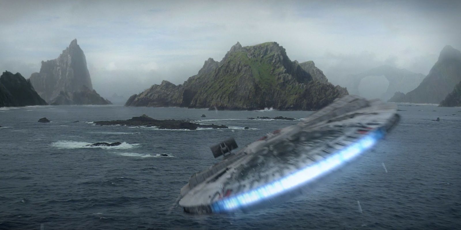 The Millennium Falcon flies towards Ahch-To in The Last Jedi