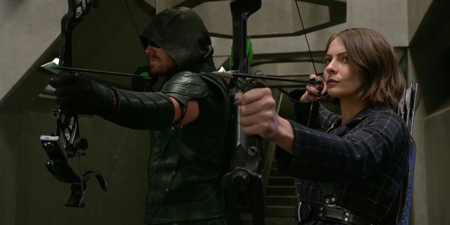 Stephen Amell and Willa Holland in Arrow Season 4 Episode 22
