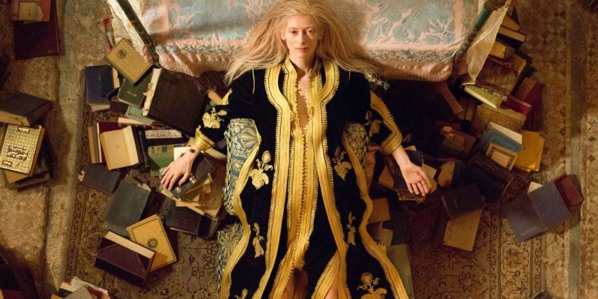 Eve (Tilda Swinton) lying on her bed in a Bohemian robe in Only Lovers Left Alive