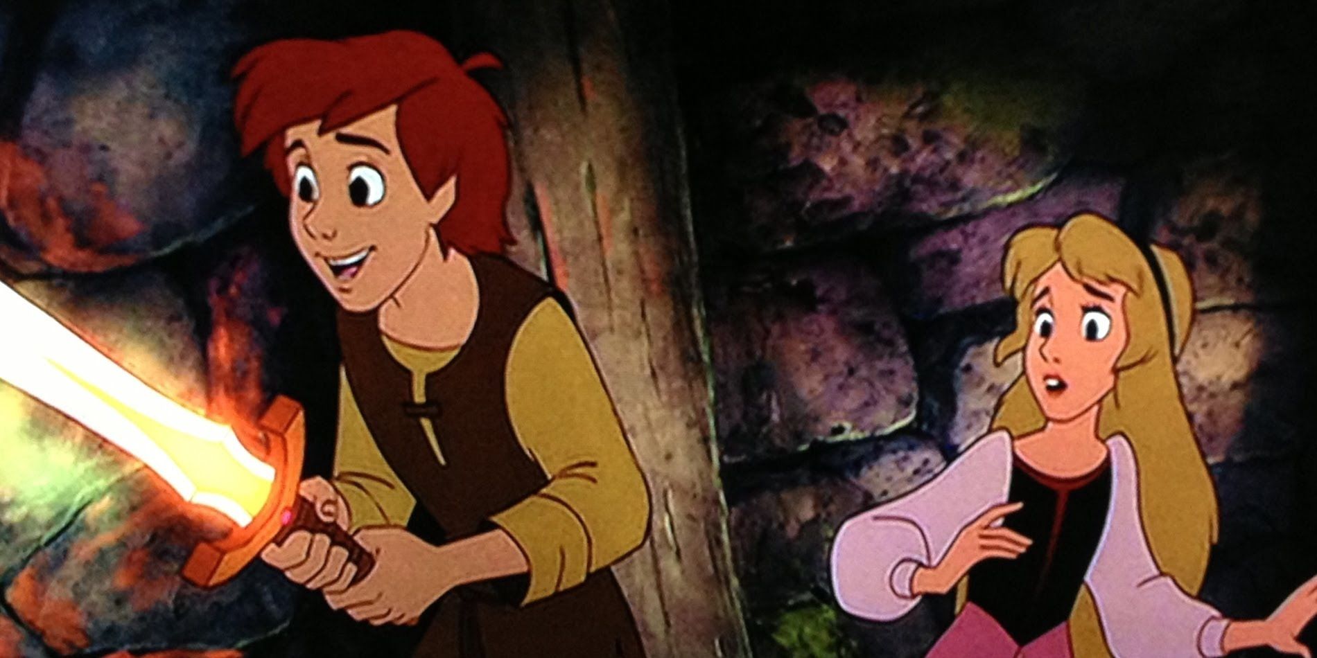 Taran holds a light sword looking fascinated while Eilonwy looks scared in The Black Cauldron