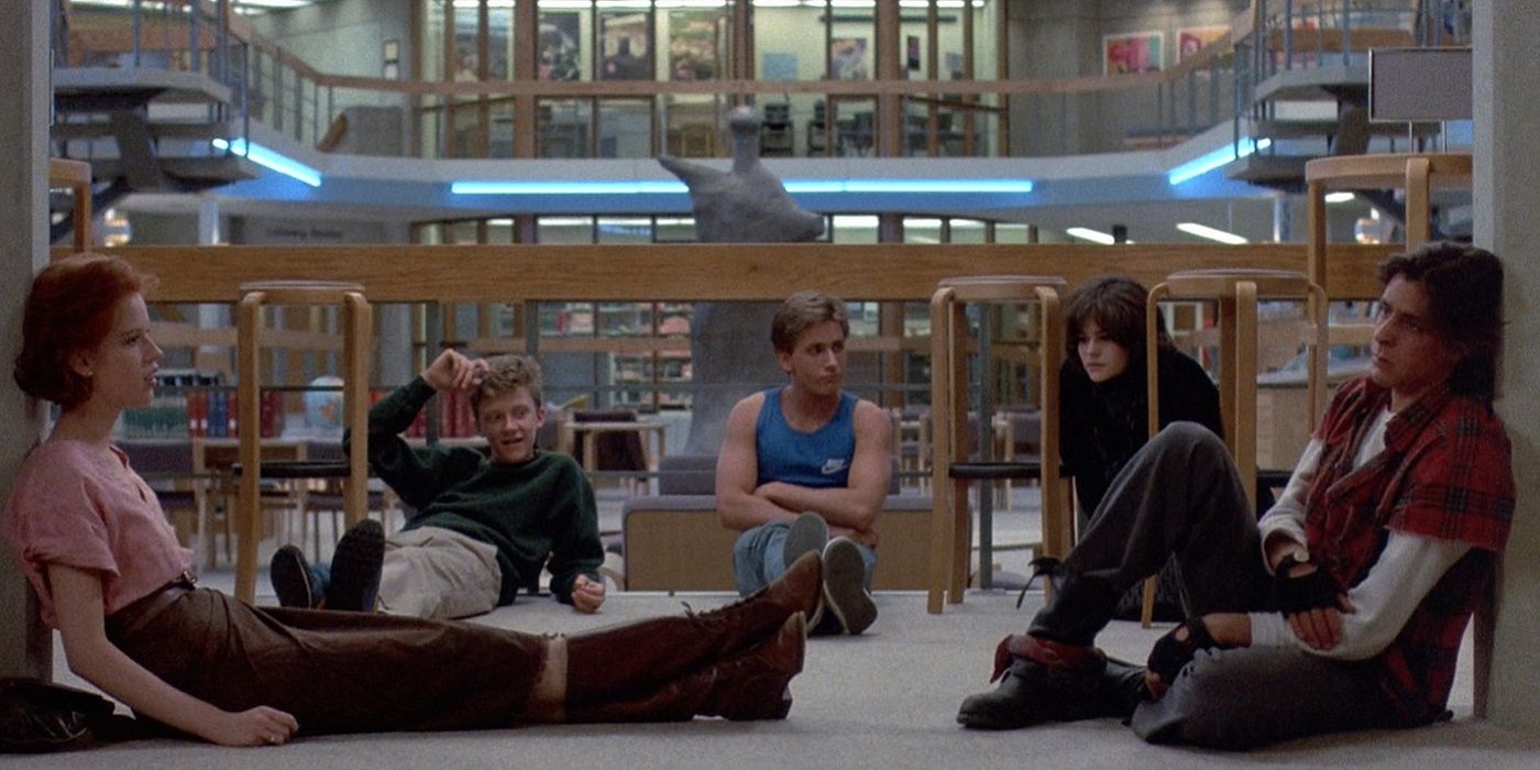 The five students sit on the floor in the library in The Breakfast Club