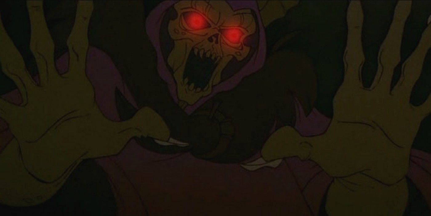 The Horned King in The Black Cauldron lunges at the viewer.