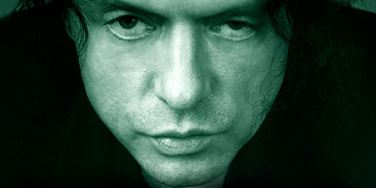 The Room Movie Poster shows the character Johnny leering at the audience.