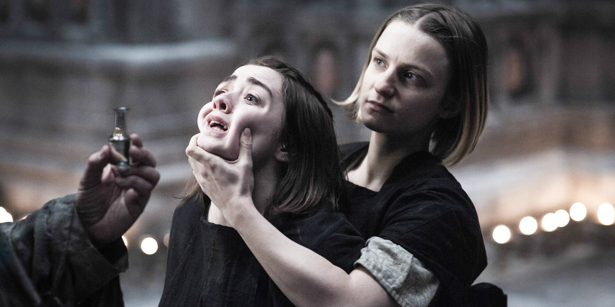 The Waif holding Arya's face on Game of Thrones