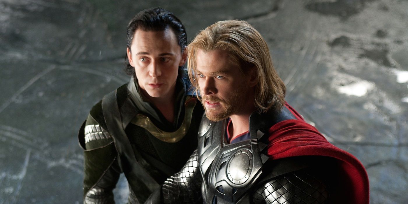 Thor and Loki standing in Odin's throne room