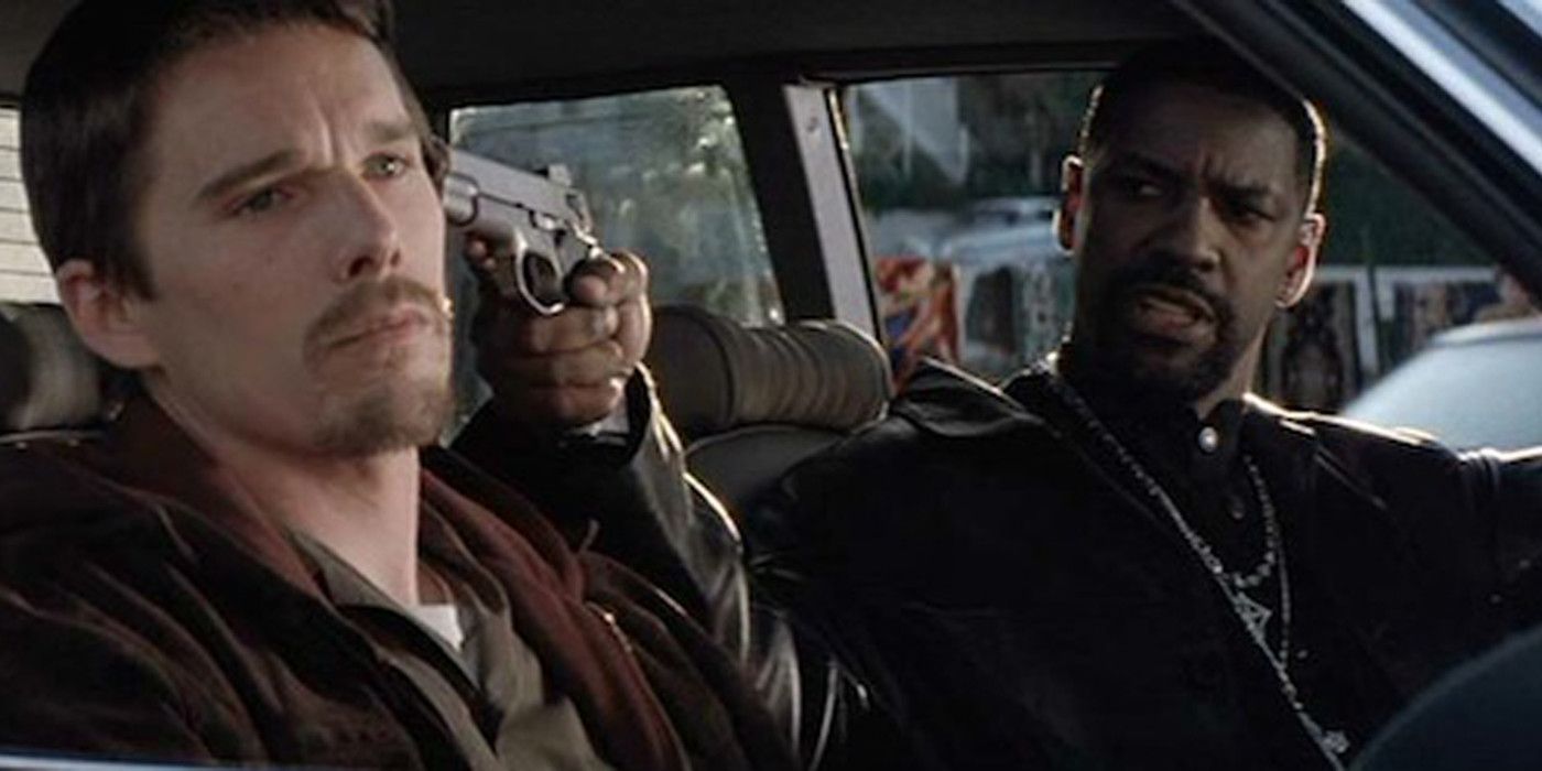 Alonzo Harris (Denzel Washington) Holds a Gun to the head of Eli Hoyt (Ethan Hawke) in Training Day