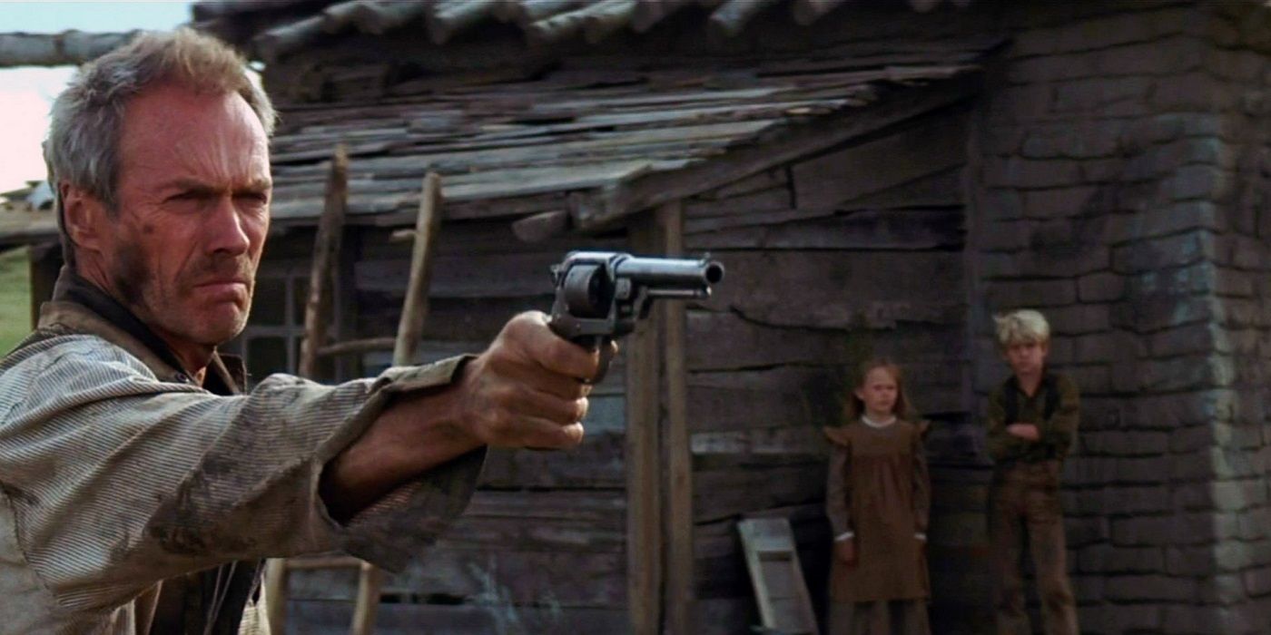 Clint Eastwood aiming a gun in Unforgiven