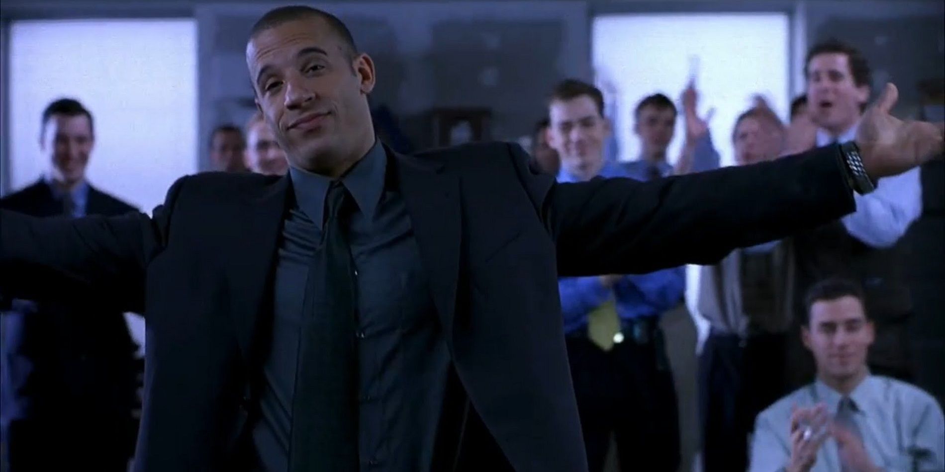 Vin Diesel with his arms stretched out in Boiler Room